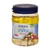 צנצנת של גבינת בולגריית קוליות, עם תפסן כחול, מלאה בשמן ומקושטת בקוביות גבינה.