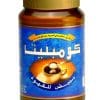 תיאור ALT לתמונה: צנצנת קפה עם עיצוב כחול, מכסה זהב ותמונה של כוס קפה עם כפית וסוכר. על הצנצנת כתוב טקסט בערבית.